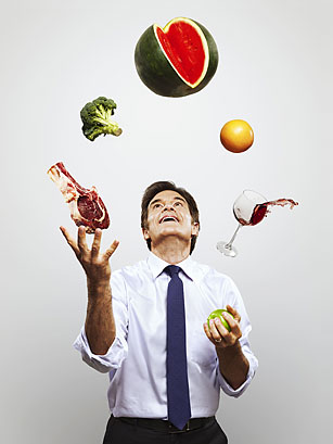 Dr. Oz juggles his food, which of course includes the all-important "protein" that is so important to him.