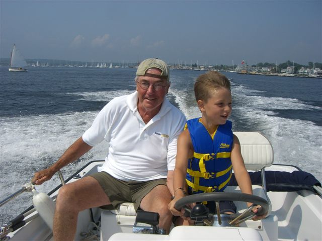 In the summer of 2009, my oldest grandson, Collin (7), stayed with me for a week while he was here for “sailing camp” at the SHYC foundation. In his thoughtful and generous manner (as always), Mike asked Collin (at breakfast) if he’d like to take a motorboat ride that afternoon. Naturally, he responded in a gleeful affirmative. A few hours later, as the fog lifted, the three of us enjoyed a spirited tour of Stonington Harbor---with young Collin at the helm.
