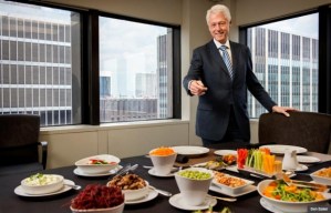 Bill Clinton about to enjoy a plant-based lunch in his Manhattan office. (Photo from the AARP article)
